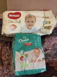 Підгузки Dada, Huggies, почата пачка