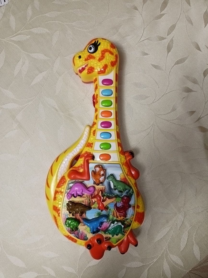 Детская музыкальная гитара "Динозавр"