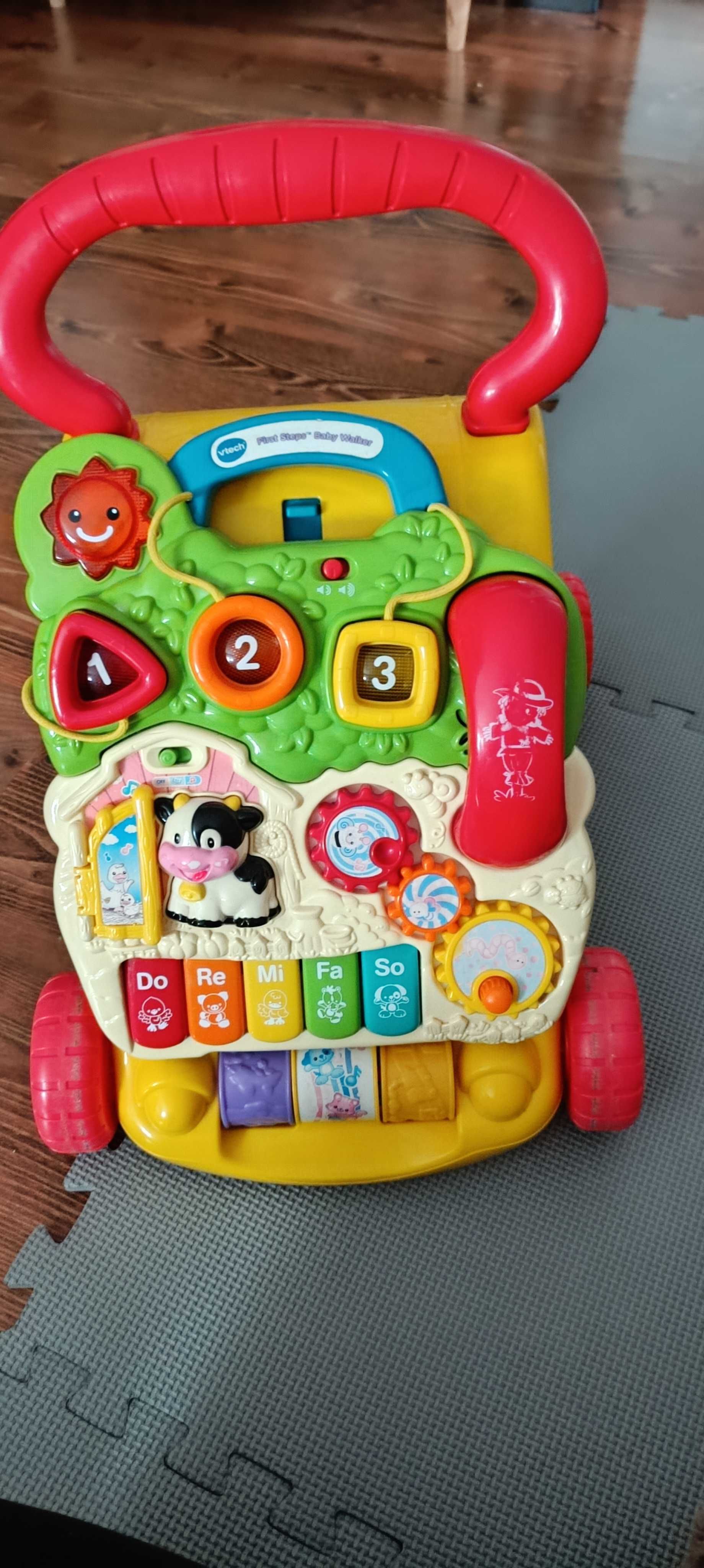 Pchacz jeździk vtech