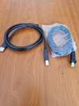 Cabos USB B (dois) para impressora.