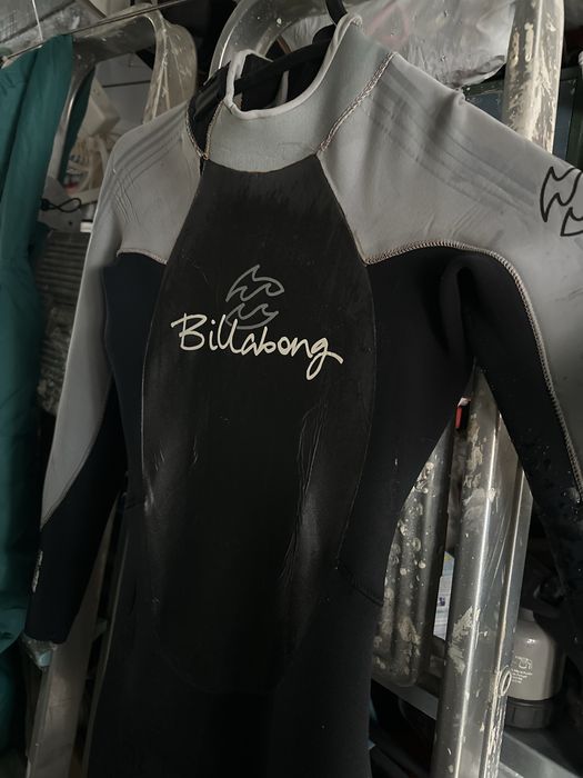 Fato de surf como novo