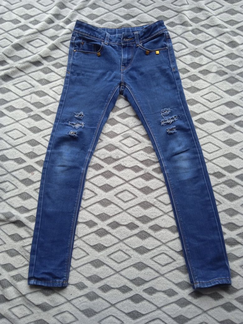 Modne jeansy dla dziewczynki skiny rurki dziury rozm. 140