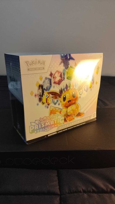 Pokémon Prismatic Evolutions ETB (English) Selado