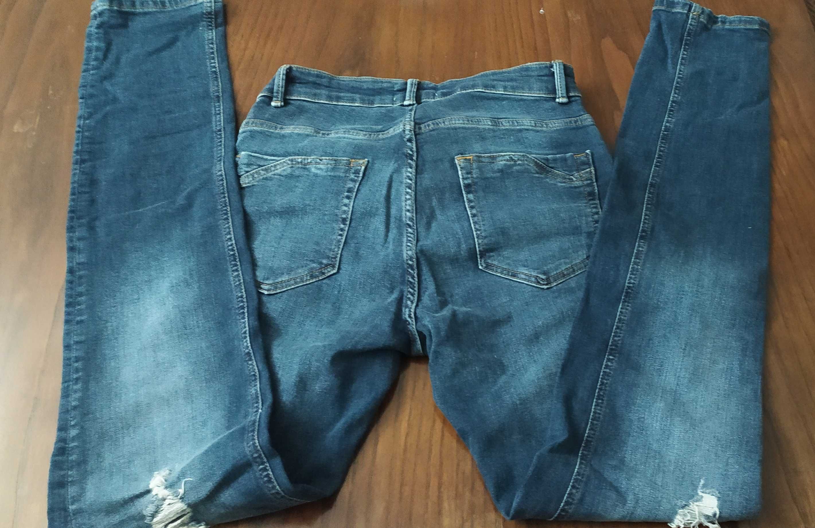 Jeans Slim Fit (efeito rasgado) - Novas