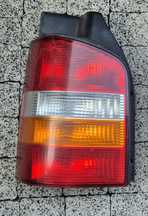 Vw T5 lampy tył tylnie lewa Hella  2003-09
