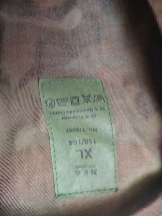 Na sprzedaż mam kamizelkę w woodland