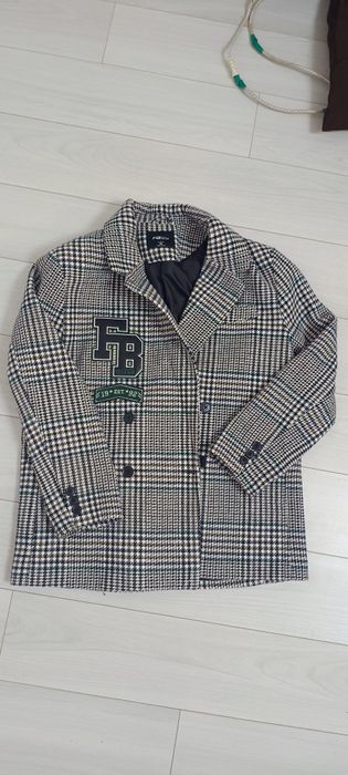 Жіночій  клітчатий теплий піджак