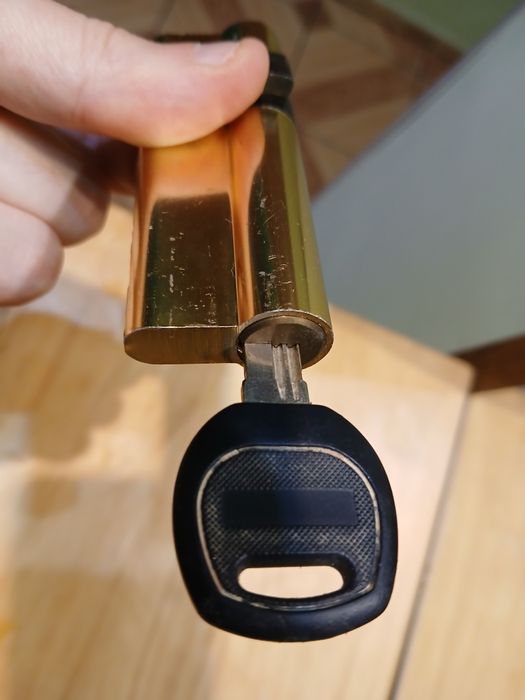 Wkładka do drzwi 35/60 mosiądz z jednym kluczykiem