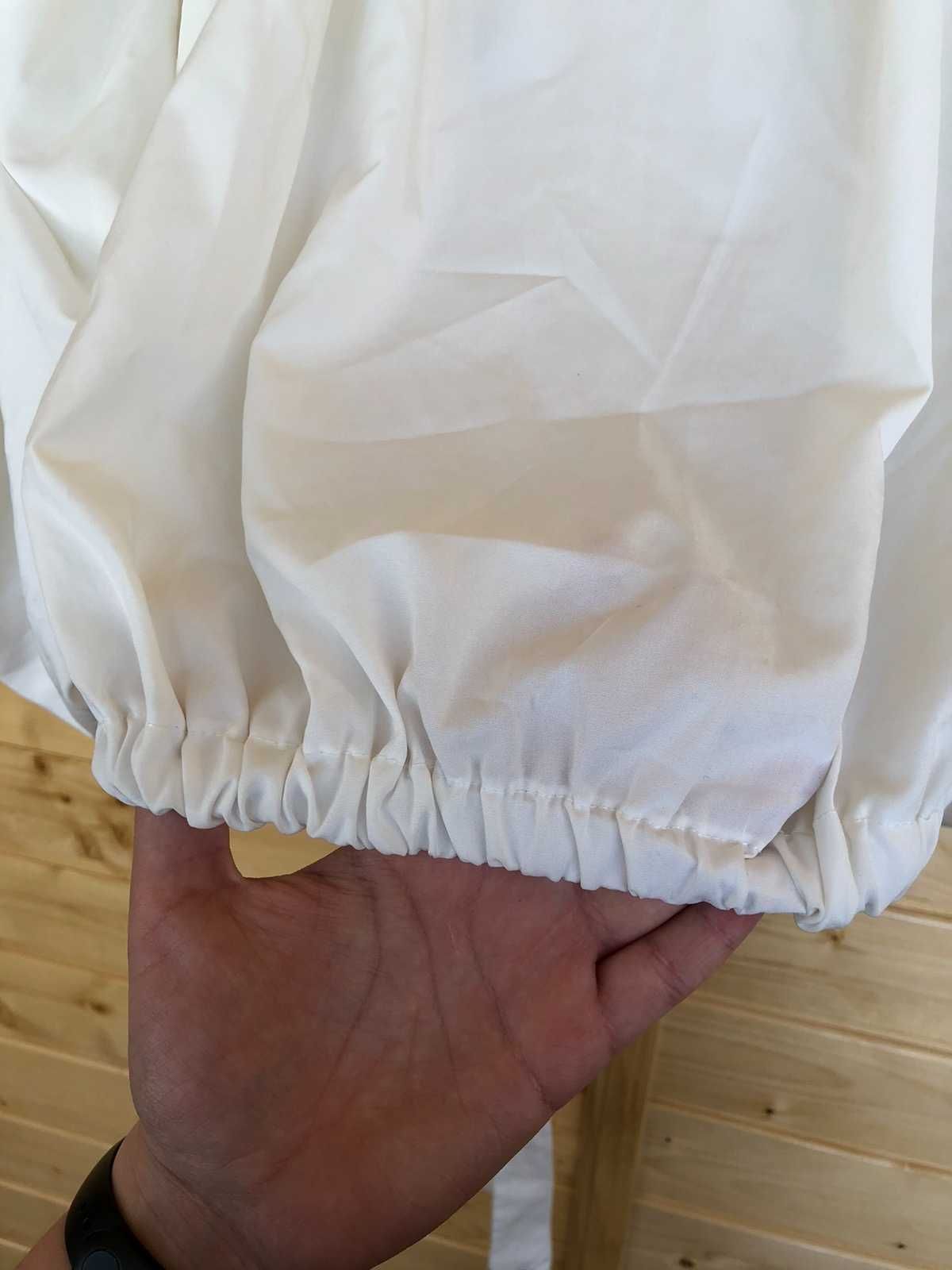Біла блузка жіноча