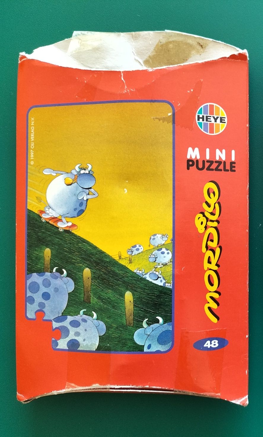 Raro Mini puzzle Heye Mordillo 48 peças