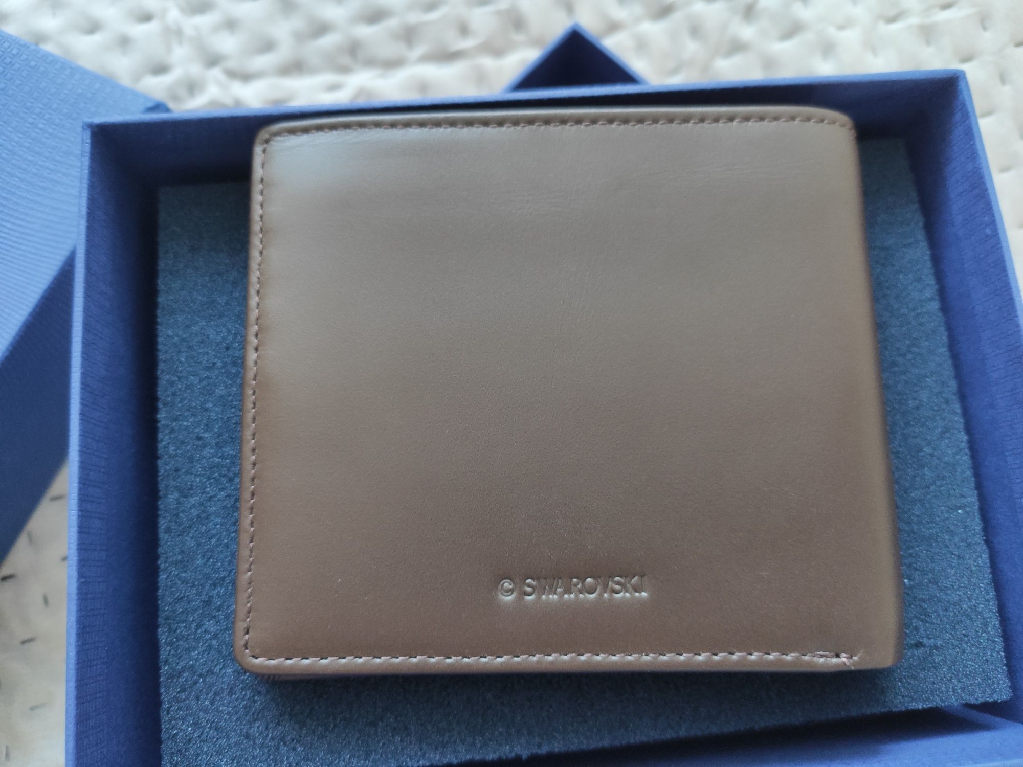 Męski portfel skórzany Swarovski brązowy nowy. Na prezent