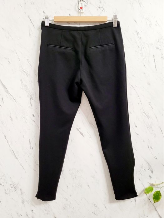 Eleganckie spodnie cygaretki premium suwaki po bokach styl preppy