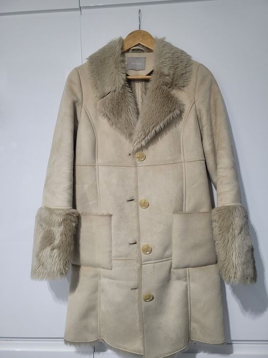 Elegancki płaszcz z futerkiem