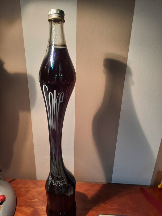 Coca-Cola  de litro, estilizada, 45 anos