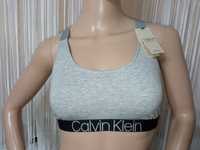 Biustonosz top sportowy damski Calvin Klein rozm M