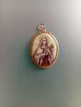 Pendente em ouro de Santa Teresinha vintage.