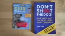 Livro e apito clique treino de cães "Don't Shoot The Dog" (como novo)