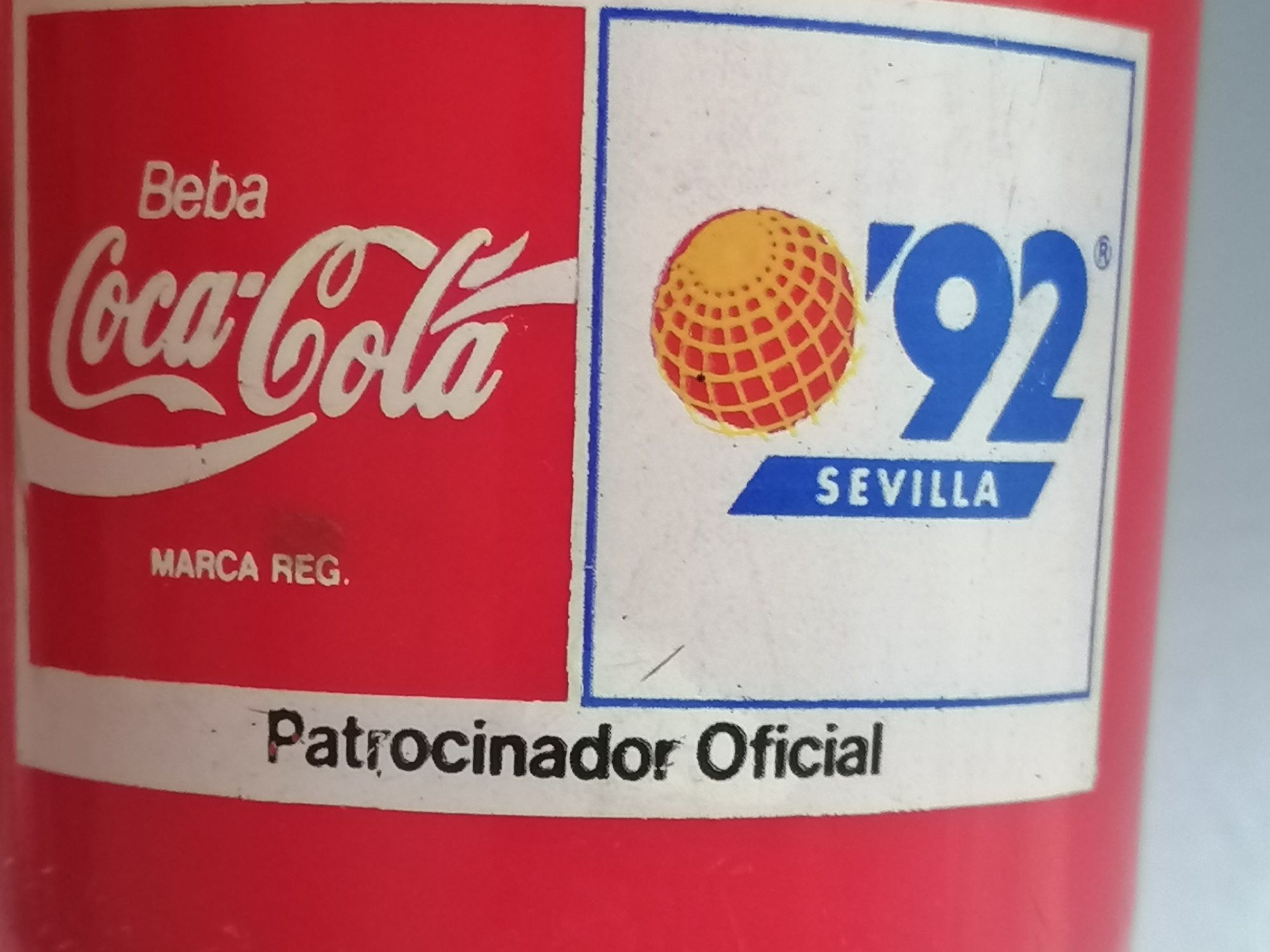 2 copos em plástico com publicidade da Coca-Cola.

. Expo 92 Sevilha
.