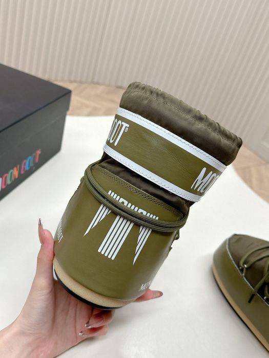 Чоботи, снігоходи, мунбути Moon Boot