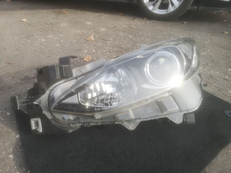 Lampa soczewka bixsenon lewy przód mazda 3 BM