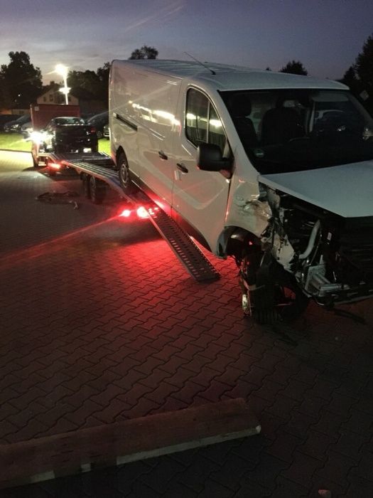 Transport samochodów aut z Niemiec Polska laweta Śląsk holowanie bus