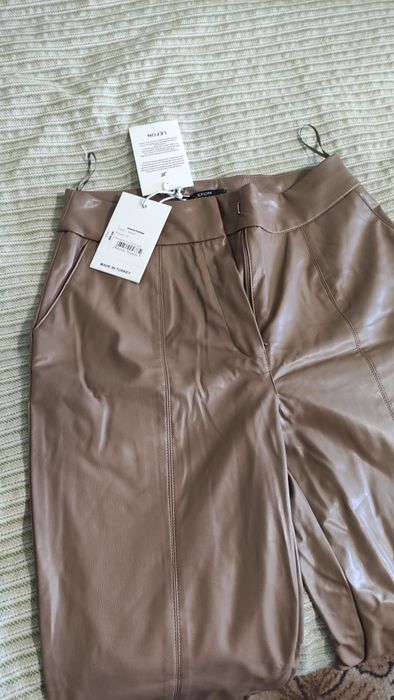 Джинси нові кожа