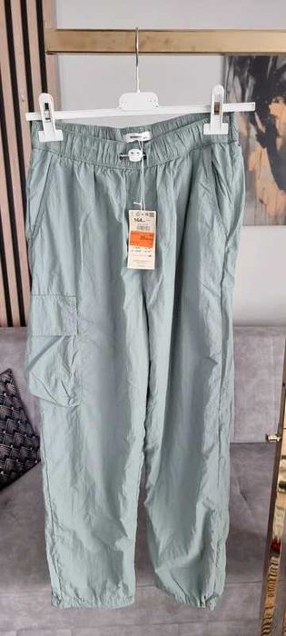 Ortalionowe spodnie parachute Reserved r.164