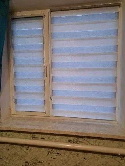 Жовтневе, виробник рулонних штор, тканинних «День-Ніч» жалюзей.