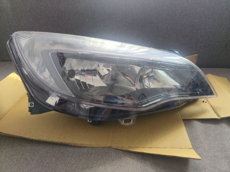 Farol Opel Astra 2011