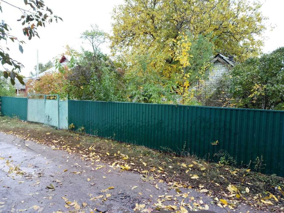 Будинок та земельні ділянки