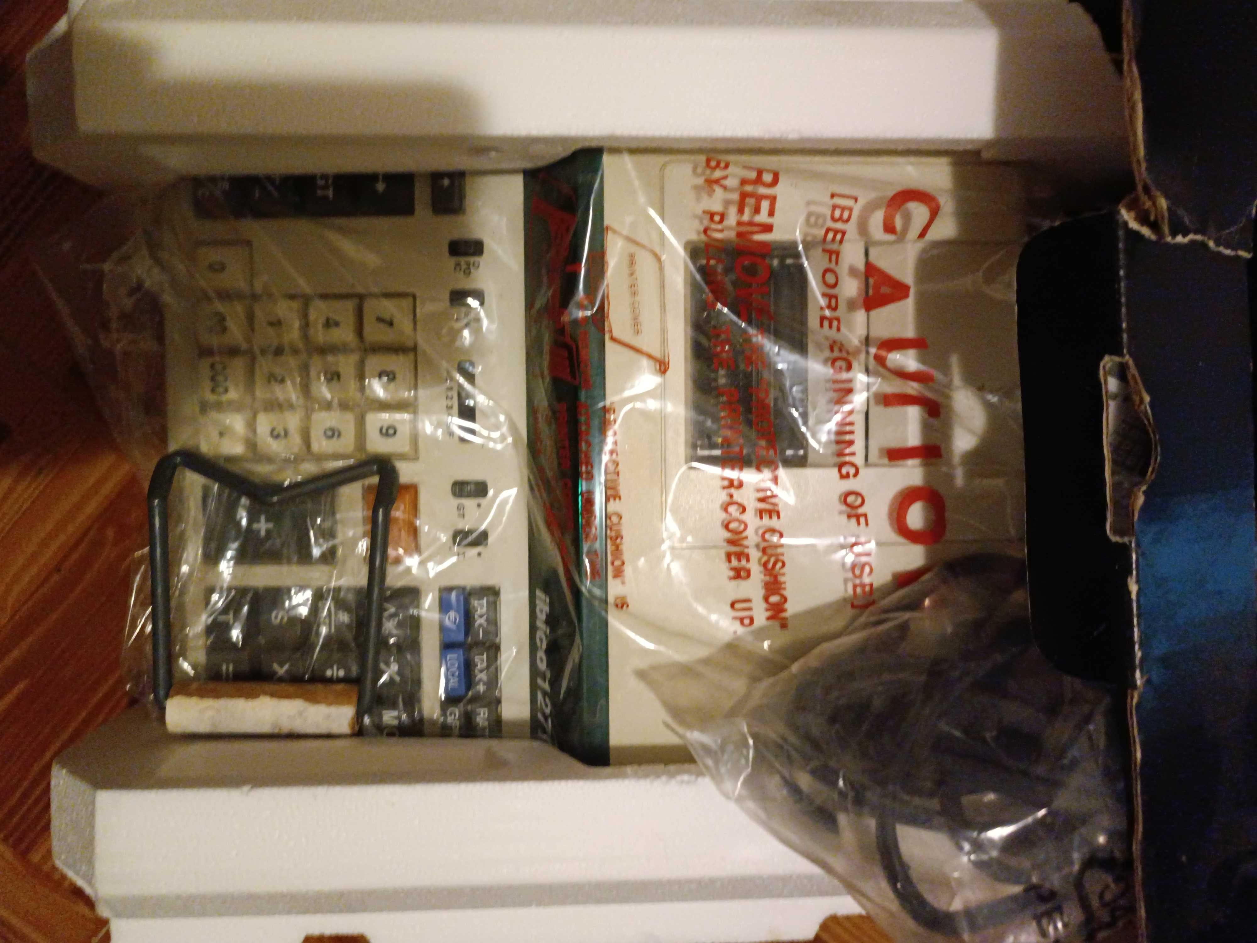 Máquina Calculadora e Recibo antiga