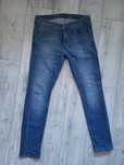 Spodnie jeansy Lee niebieskie 33/32