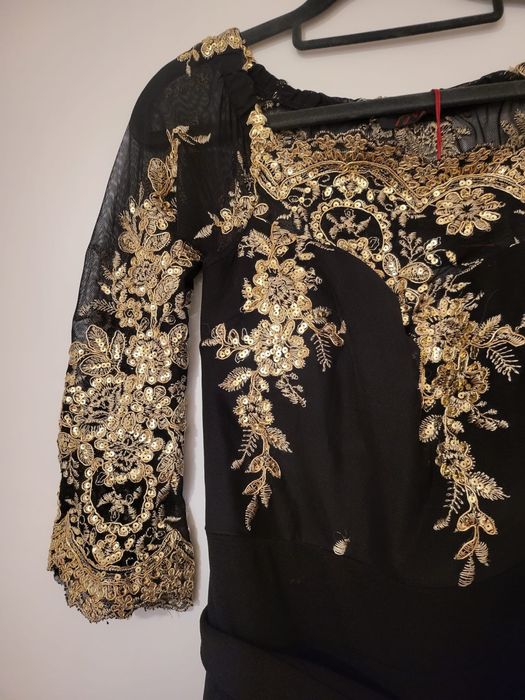 kombinezon nowy z metka