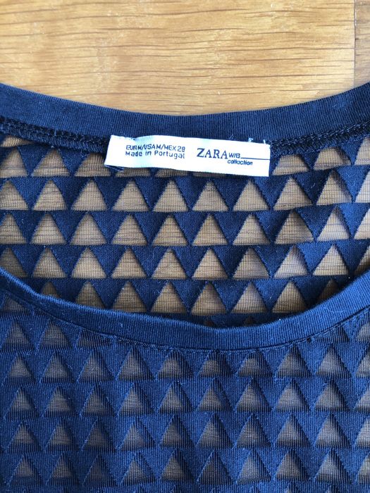 Camisola preta com manga à cava