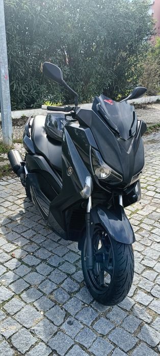 Xmax 125.  38 mil km