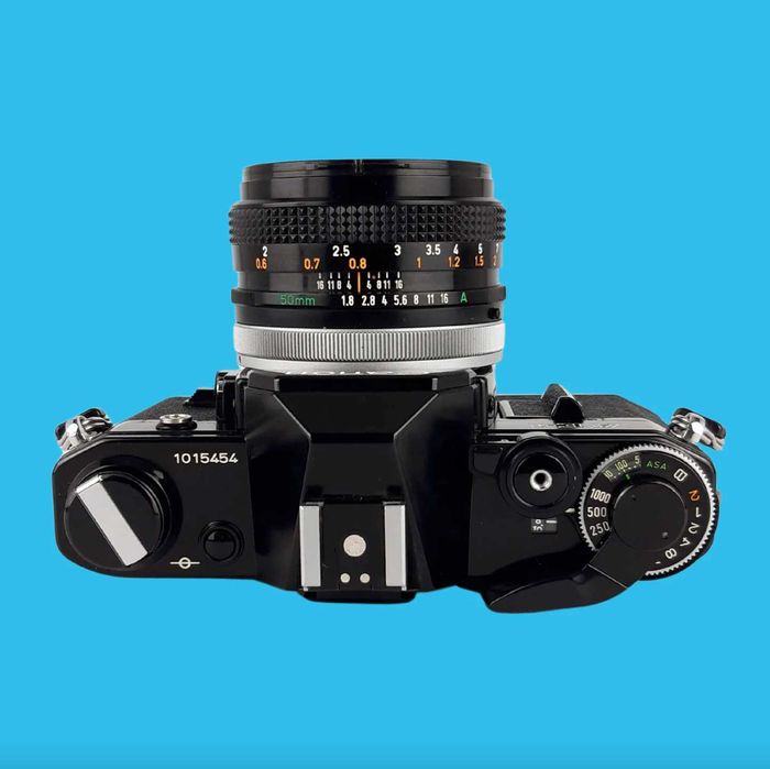 Canon AE-1 Preta + Canon FD 50mm f/1.8 Prime - (testada e limpa)