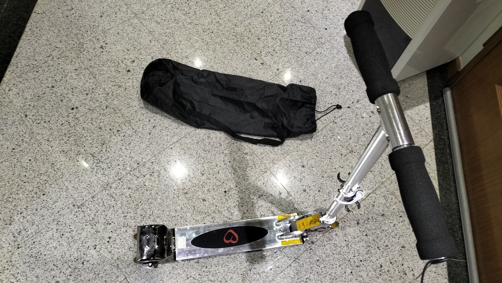 Trotinete e saco transporte