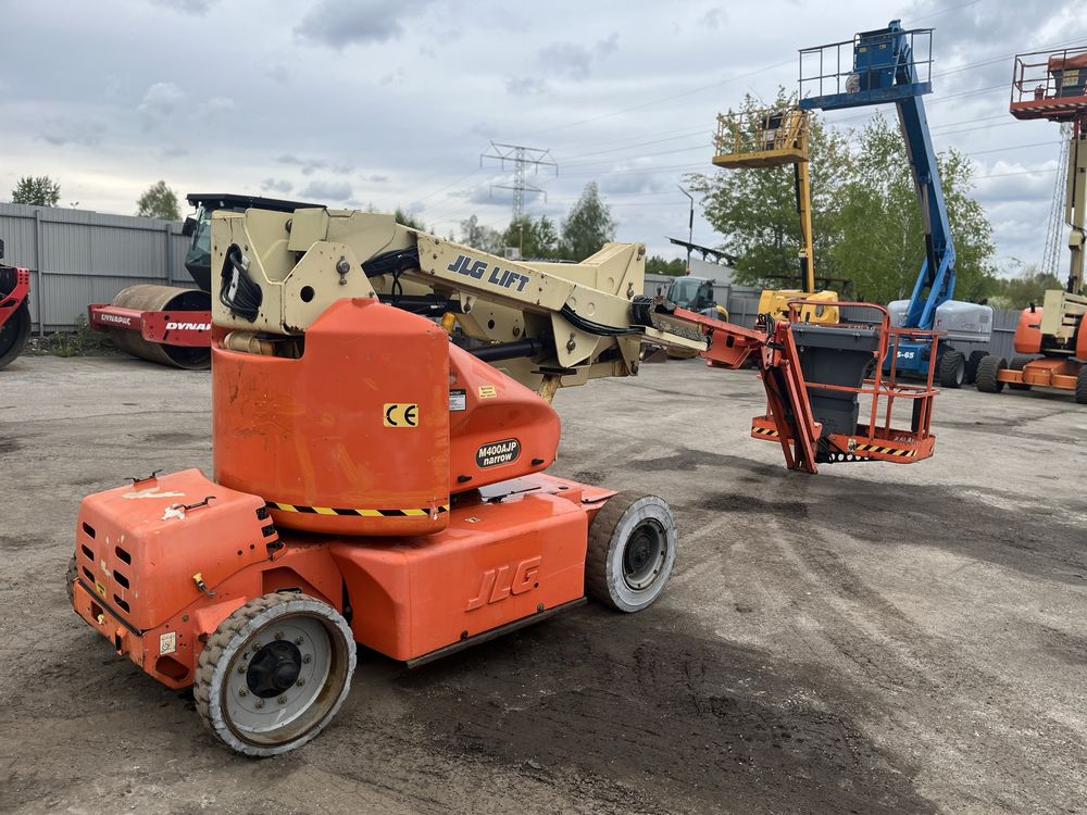 Podnośnik przegubowy JLG M400 genie 450