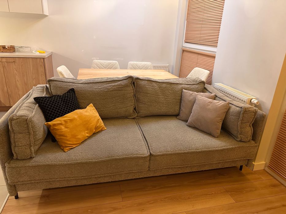 Szara rozkładana kanapa