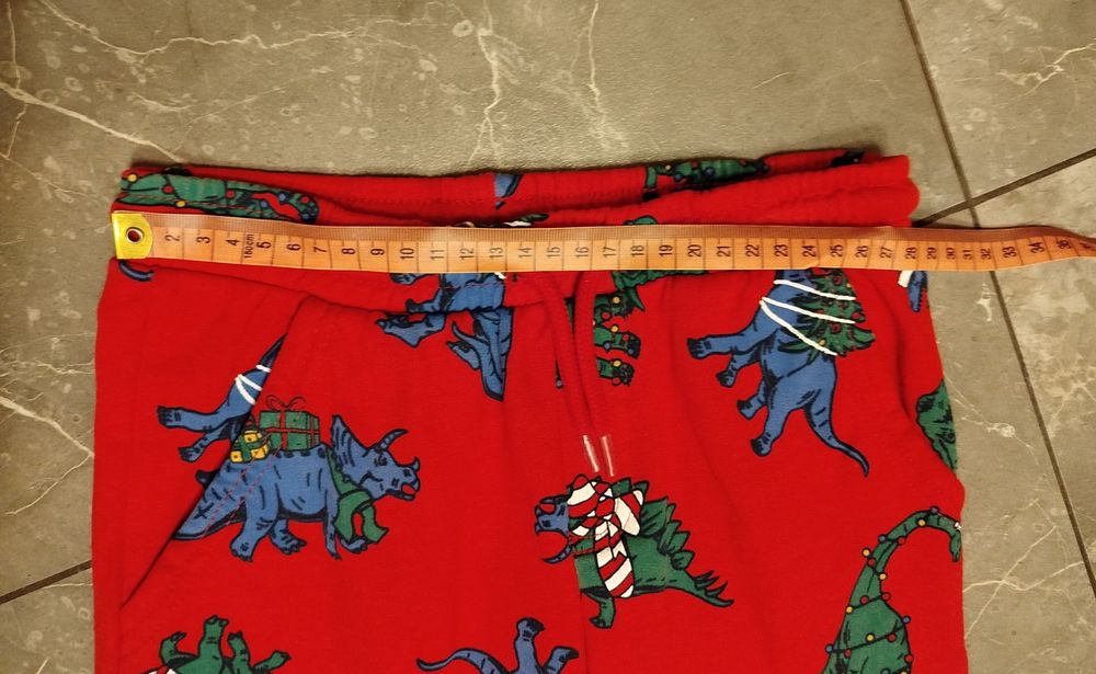 Spodnie chłopięce z dinozaurami motyw świąteczny