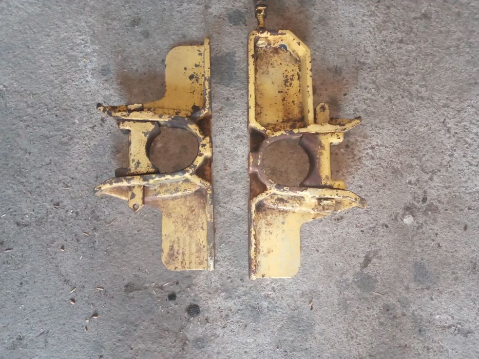 Uchwyt wspornik gardzieli New Holland 1520,1530,1540,1550
