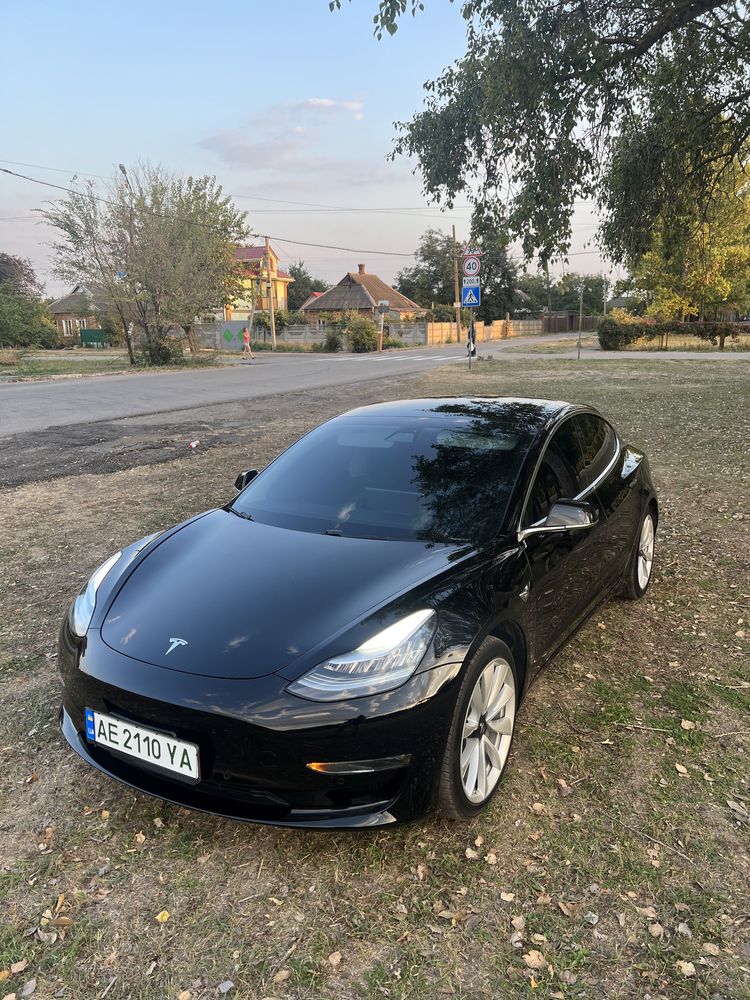 Тесла model 3