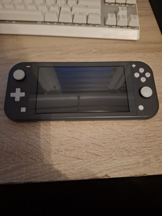 Nintendo switch lite + Gry