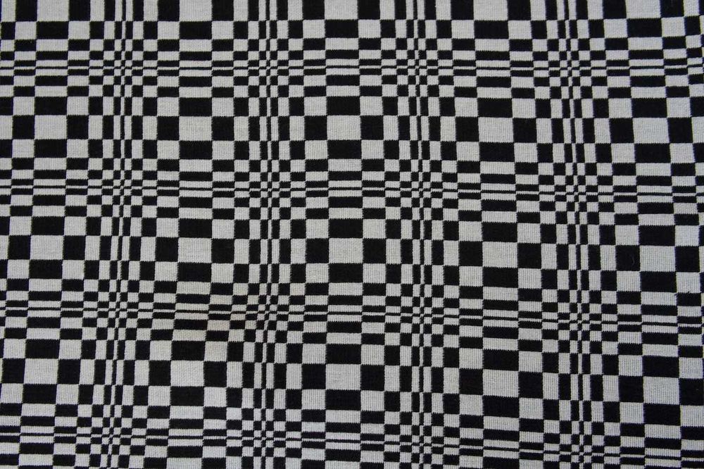 Czarno-biała tkanina w ciekawy geometryczny wzór