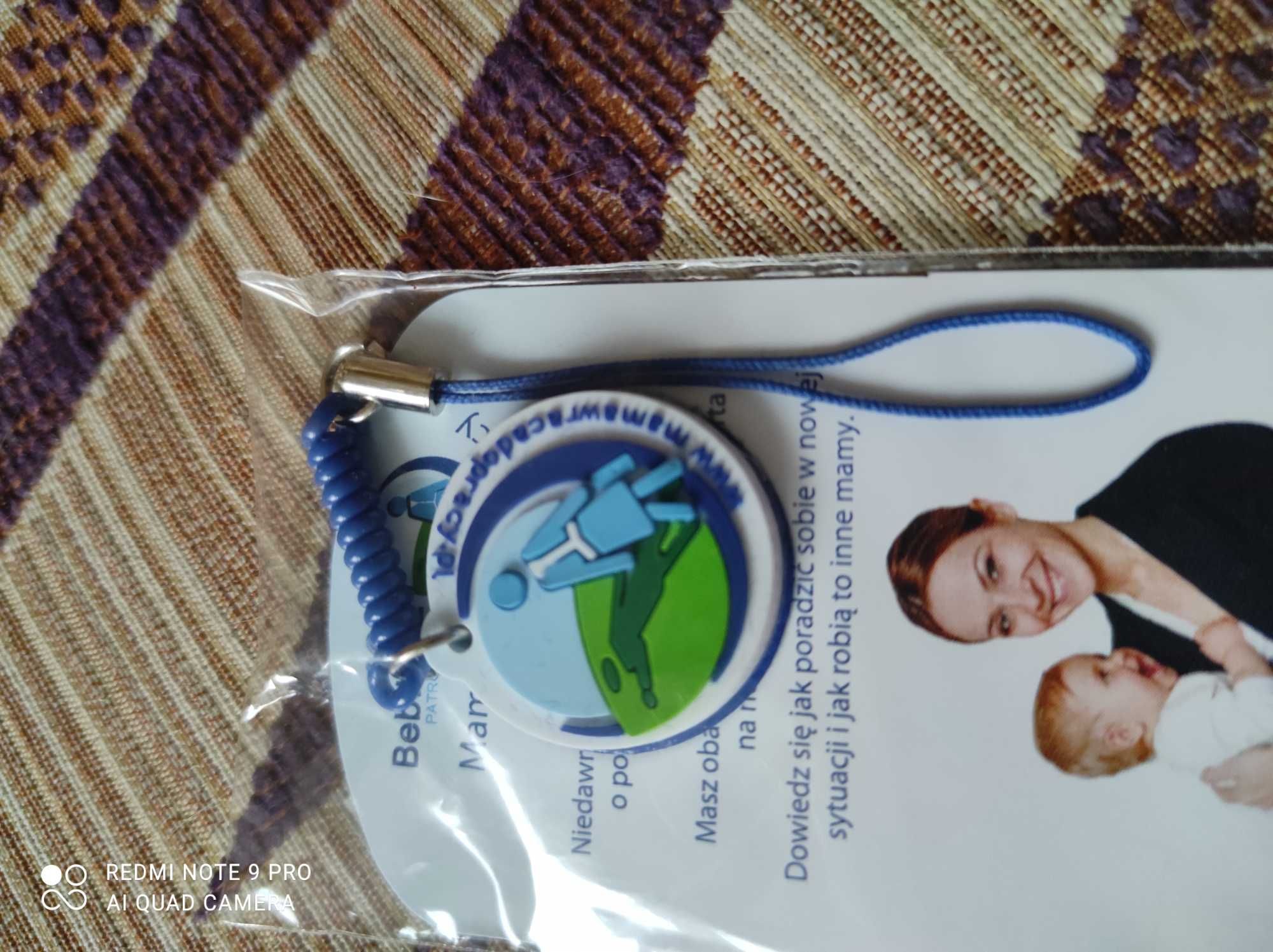 Brelok Humana i Mama wraca do pracy