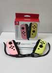 Joy-cony Nintendo Switch para pastel pink/yellow