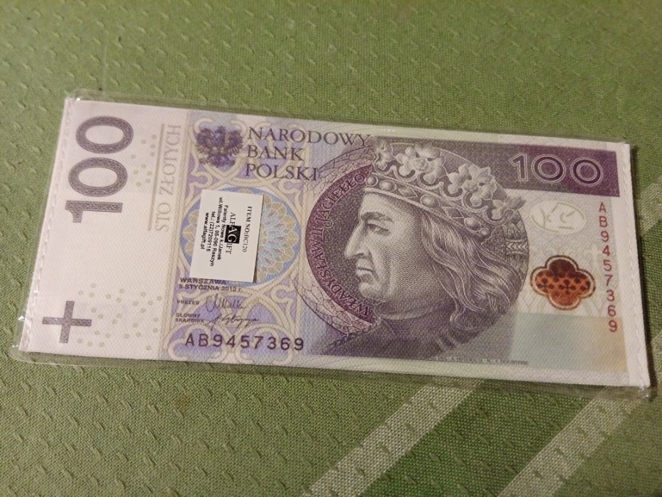 100 zł -portfel/saszetka. Extra gadżet.