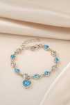 Pulseira Elegante Prateada com Coração Azul