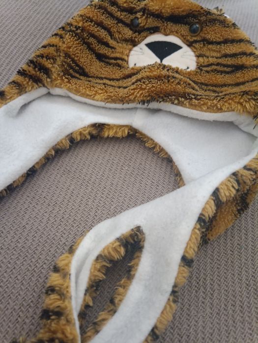 Czapka tygrysia łatwe wiązanie.