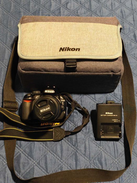 Nikon D3100 + bolsa + carregador + cartão memória
